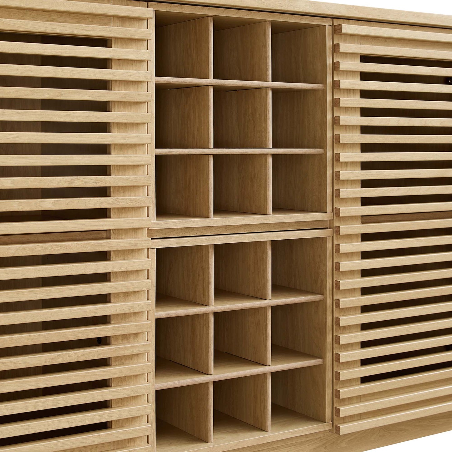 Brown oak bar cabinet with slatted side panels and two grid-style central cubby racks.