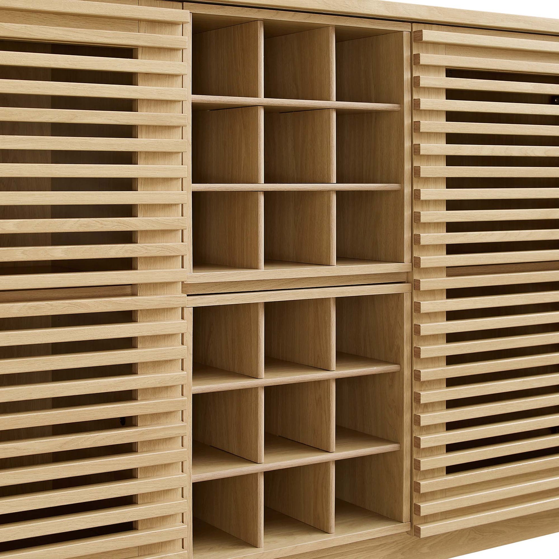 Brown oak bar cabinet with slatted side panels and two grid-style central cubby racks.