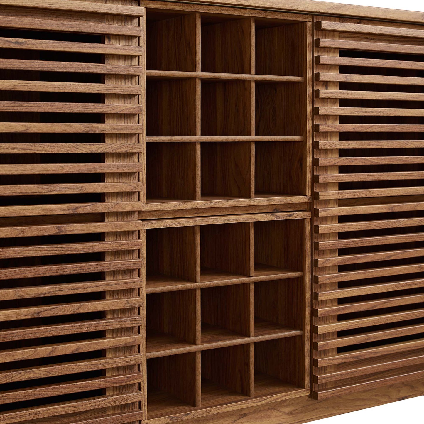 Walnut wood cabinet with slatted doors flanking a grid of open cubby shelves in the center.