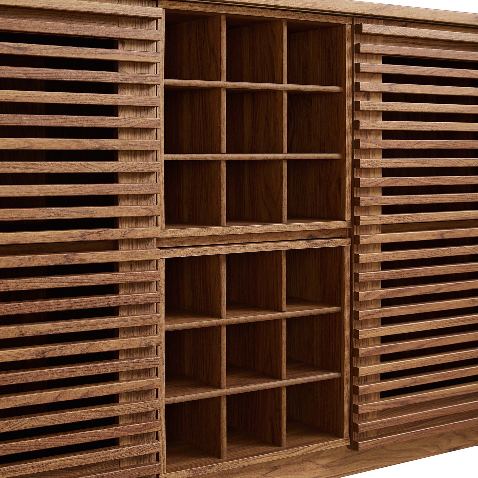 Walnut wood cabinet with slatted doors flanking a grid of open cubby shelves in the center.