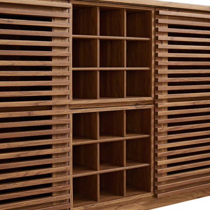 Walnut wood cabinet with slatted doors flanking a grid of open cubby shelves in the center.