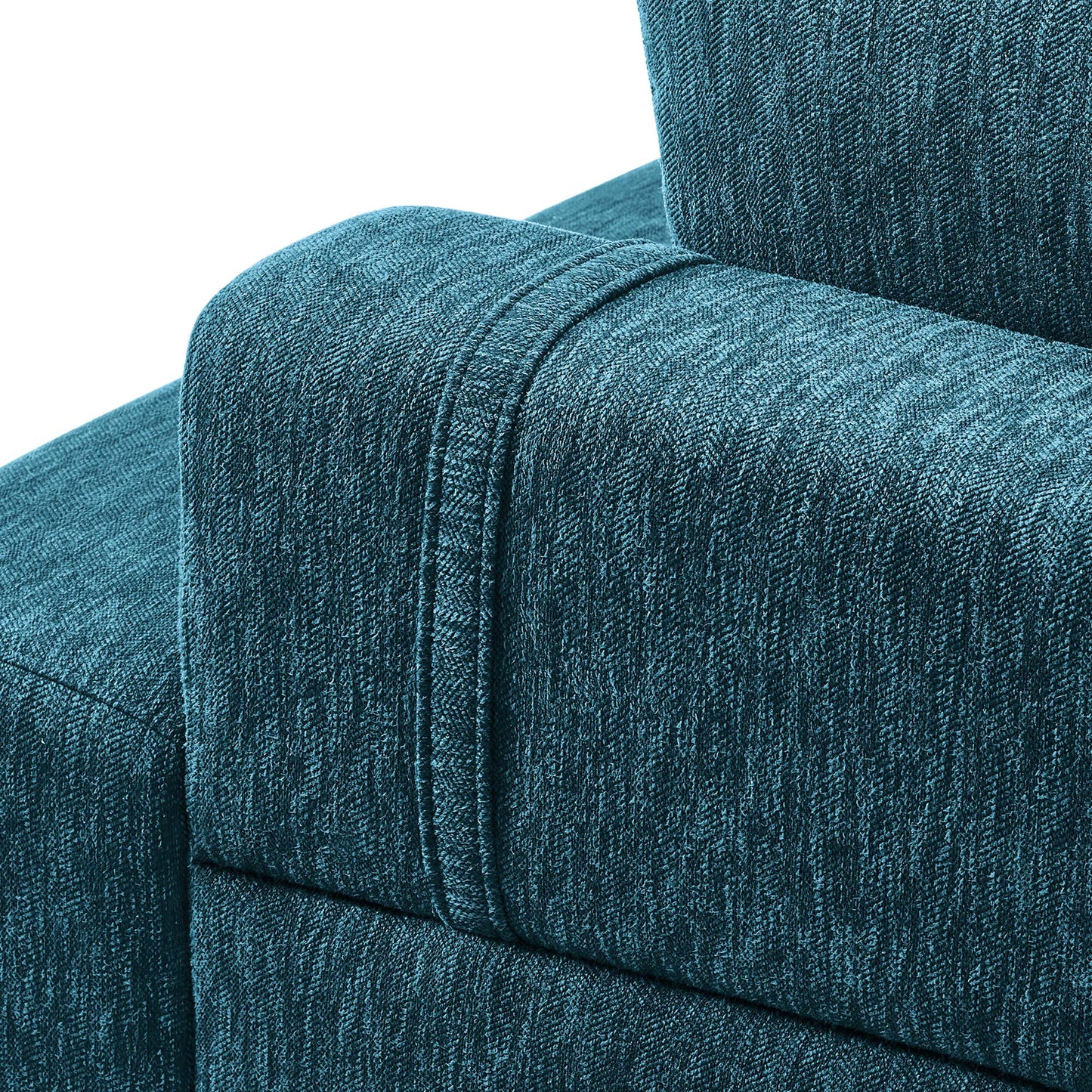 Azure textured fabric sofa with curved armrest and seam detail, modern upholstered seating.