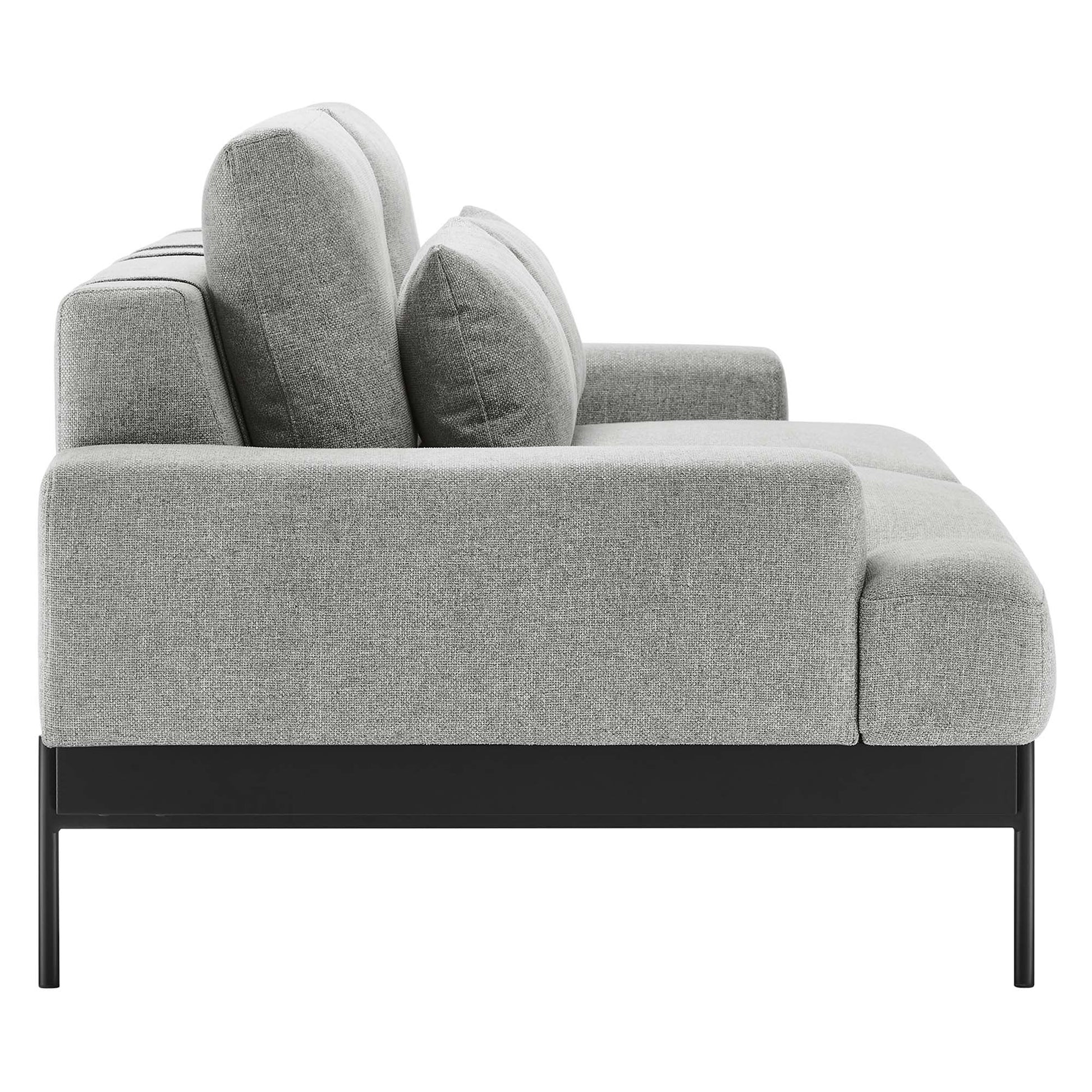 Light gray fabric sofa with black metal legs; low-profile, modern sofa with plush back cushions.