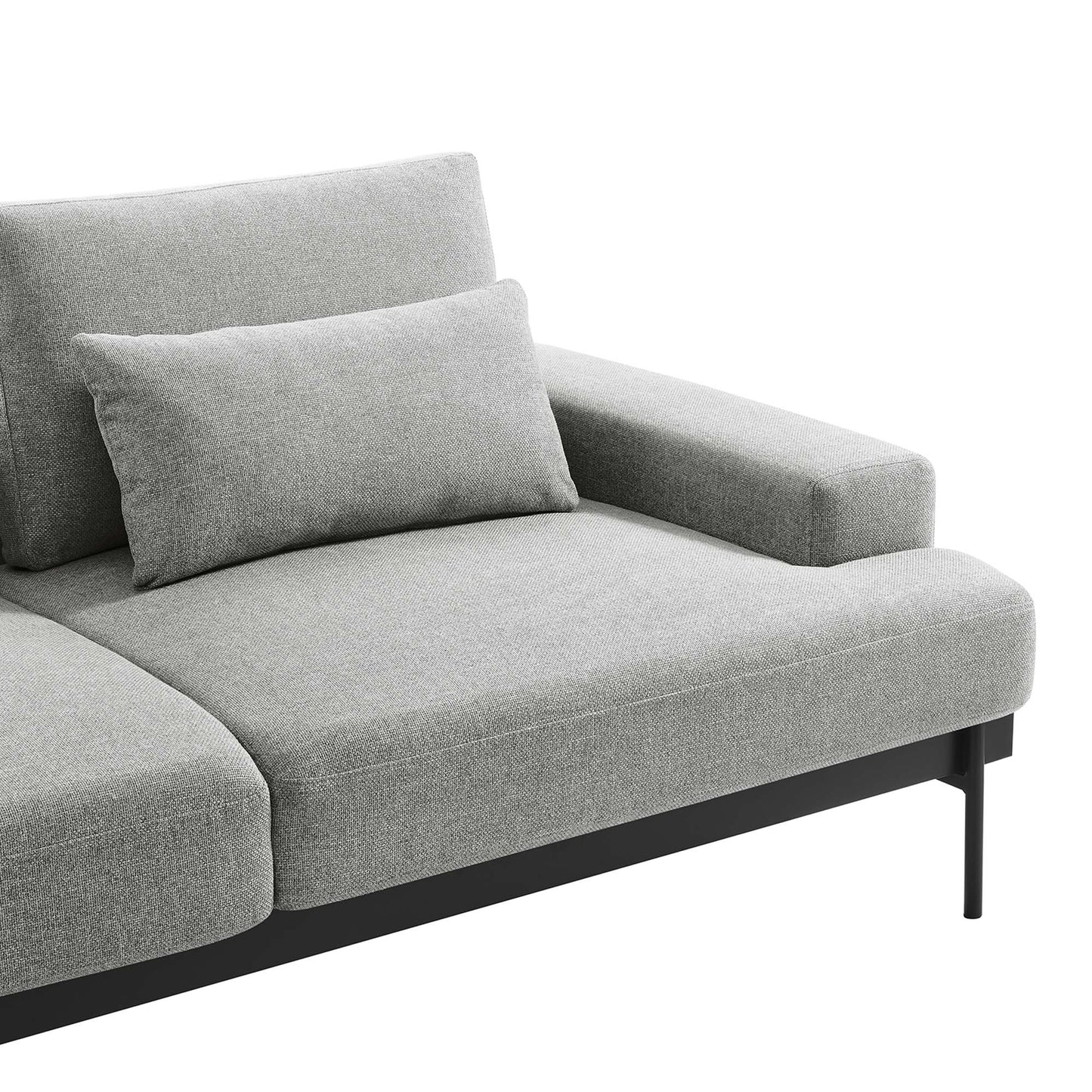 Light gray fabric sofa with rectangular cushions, a low-profile arm, and black metal legs.