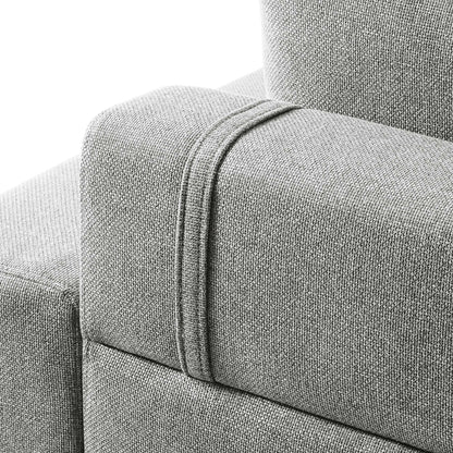 Light gray textured fabric sofa arm with a raised strap seam detail.