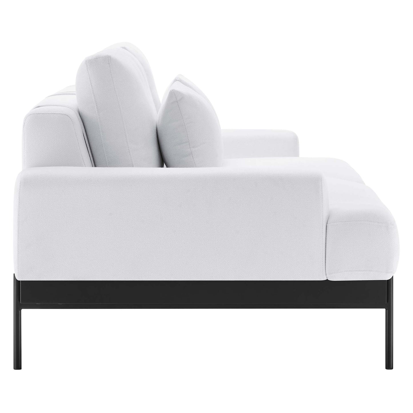 White fabric sofa with black metal legs and plush cushions, modern seating.