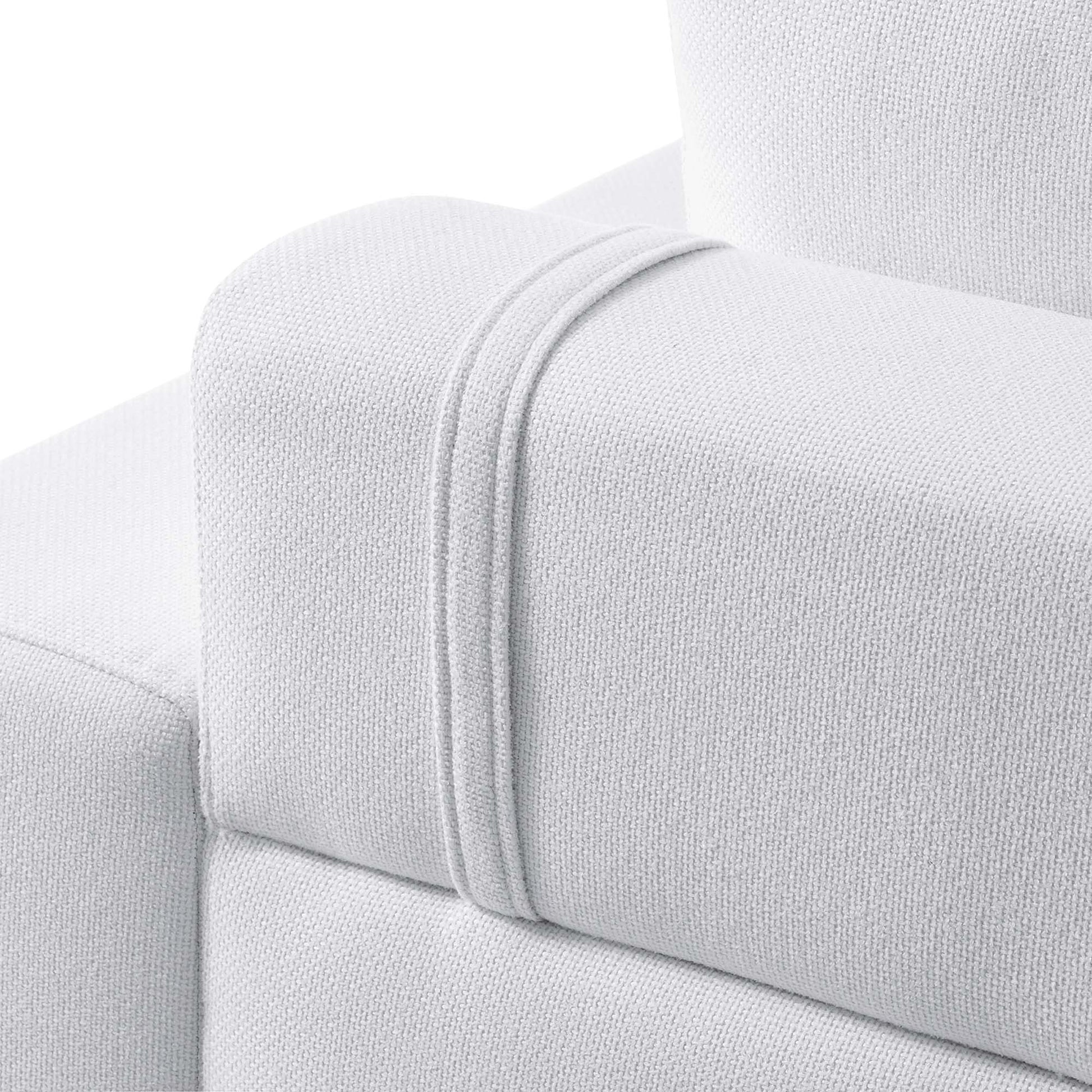 White textured boucle fabric sofa armrest with double strap wrap, modern minimalist style.