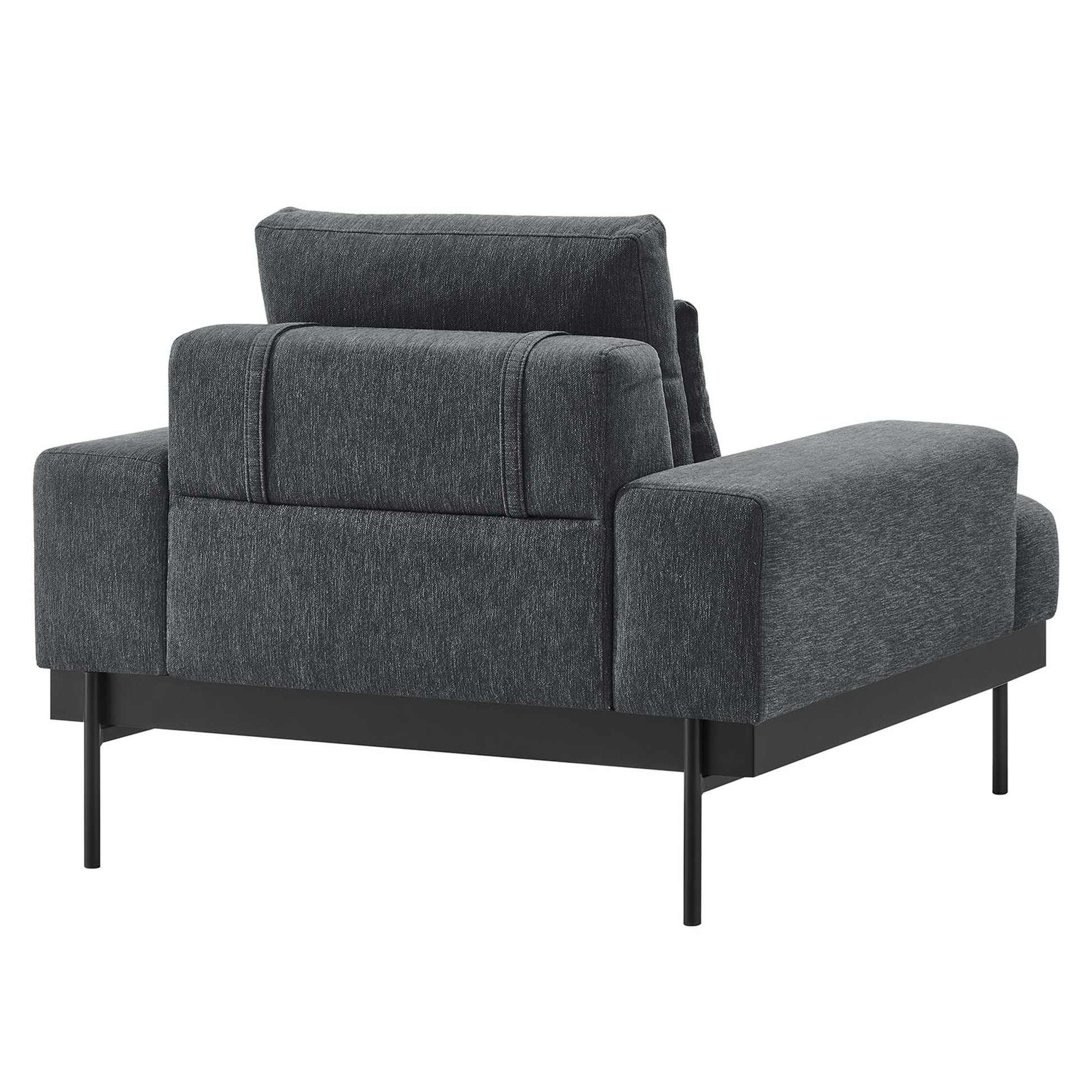 Charcoal gray fabric armchair with plush back cushion, wide arms, on a slim black metal frame.