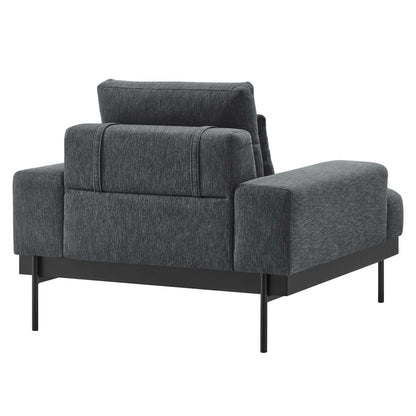 Charcoal gray fabric armchair with plush back cushion, wide arms, on a slim black metal frame.