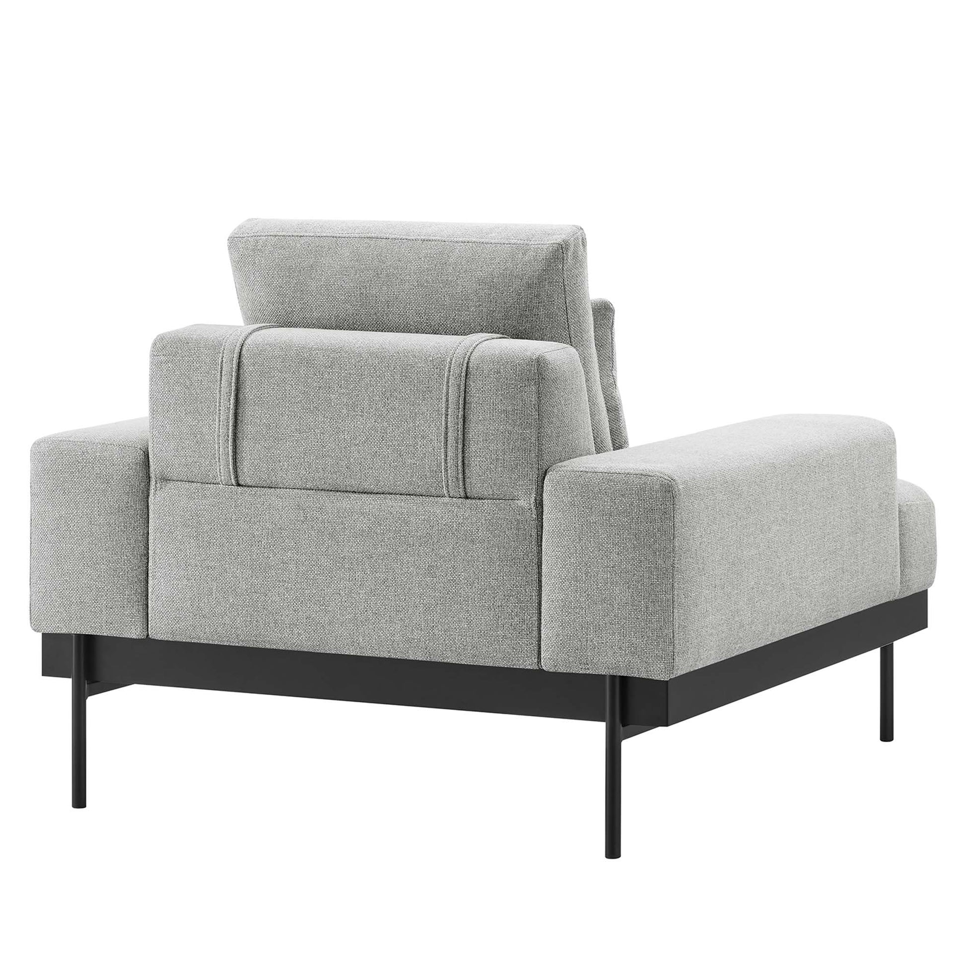 Light gray fabric upholstered armchair with square arms, black metal frame and back cushions; modern living room seating.