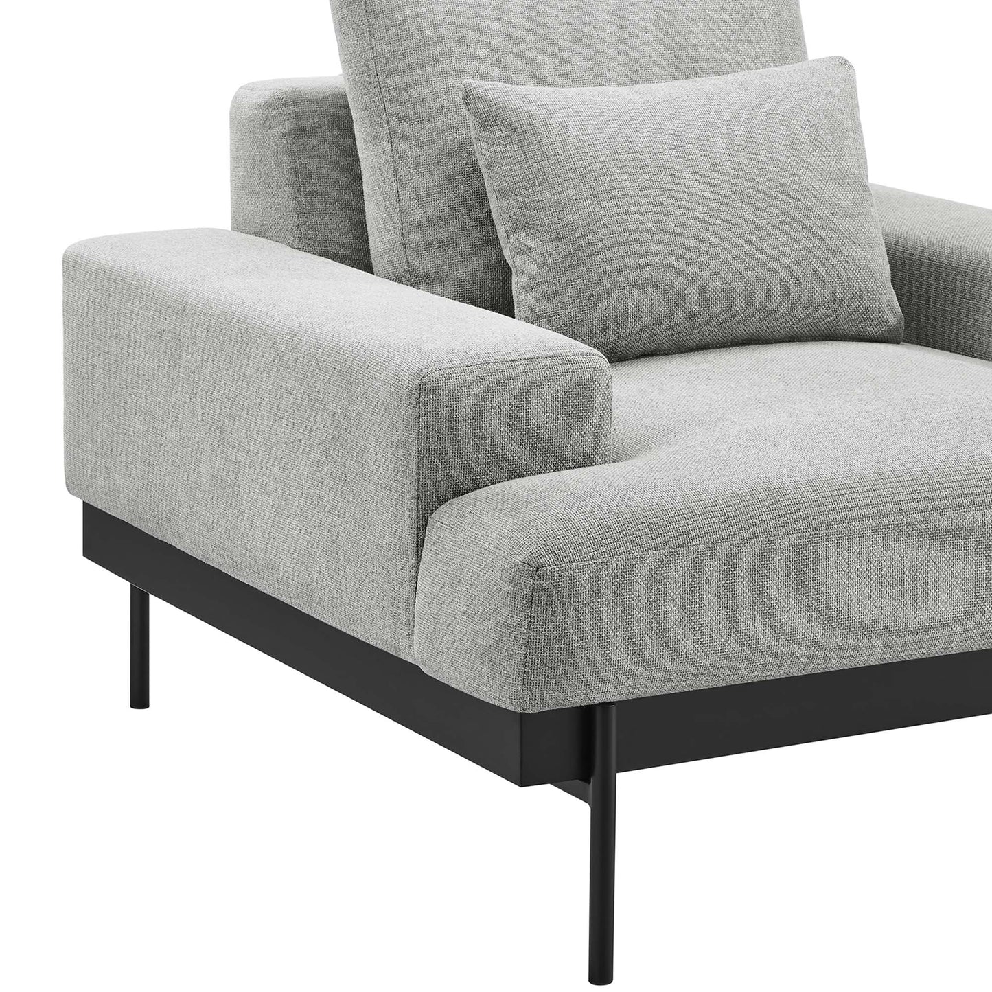 Light gray fabric armchair with square arms, slim black metal legs, and a matching back cushion.