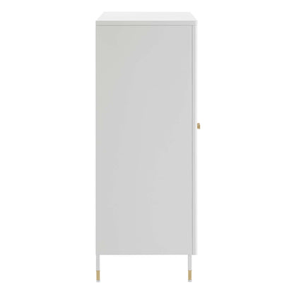 Tall light gray freestanding cabinet with one door, slim rectangular form, brass-tipped legs and a small knob.