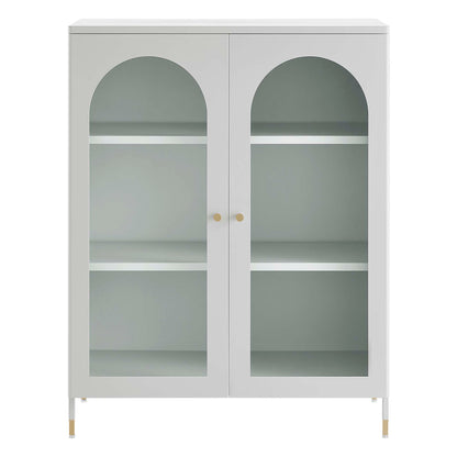 Light gray archway accent cabinet with two arched glass doors, gray interior, two shelves, gold knobs and slim gold legs.