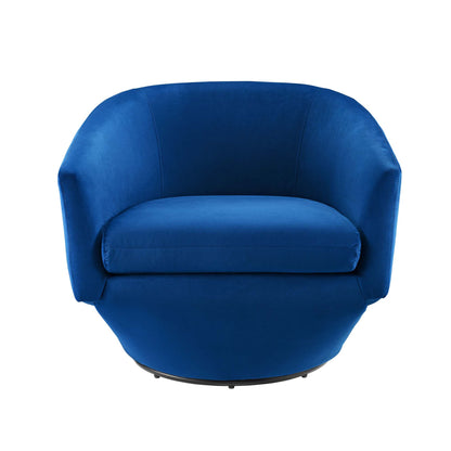 Royal blue velvet swivel chair with curved arms, plush cushion, on a swivel base