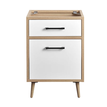 Oak-framed bathroom vanity cabinet in white with black hardware; sink not included.