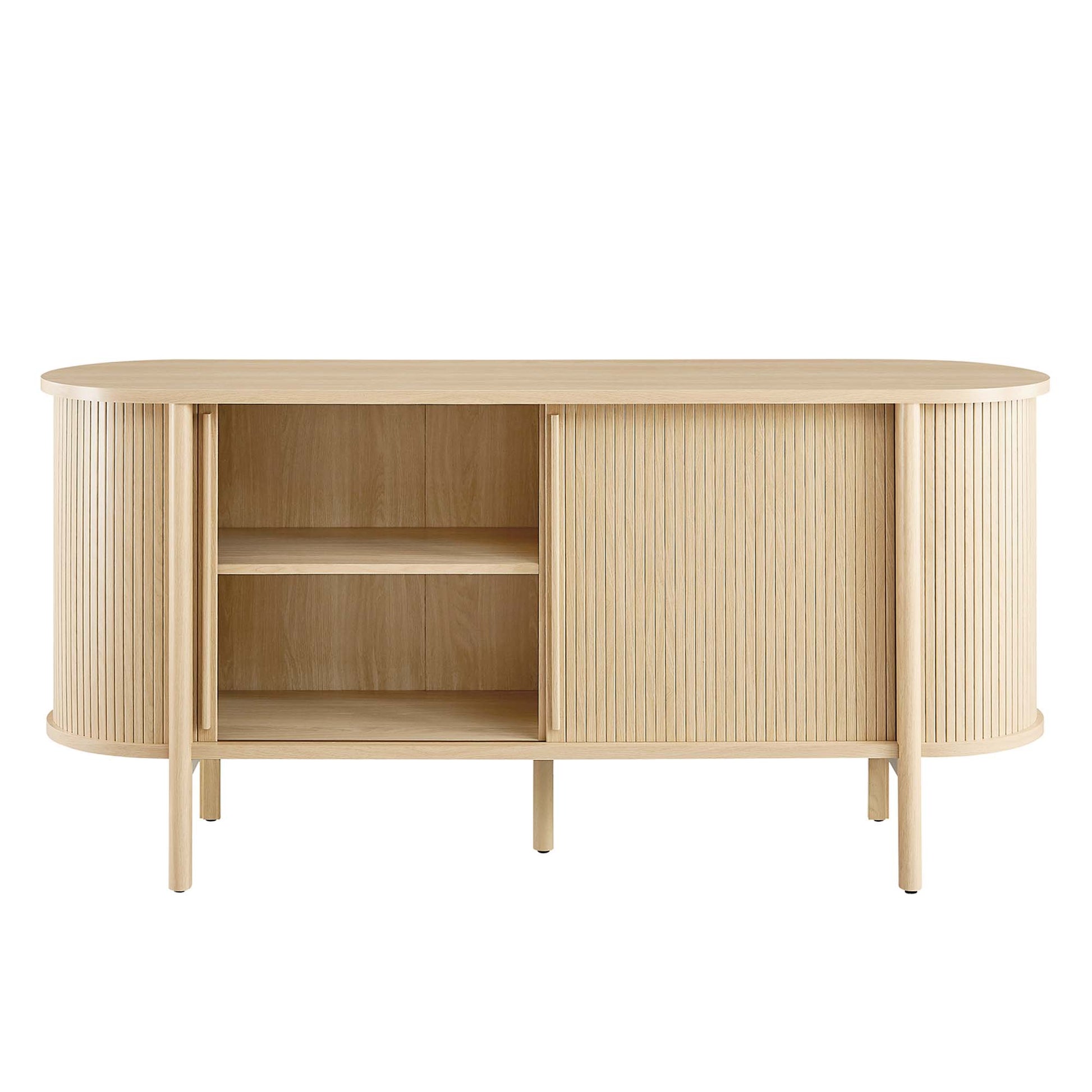 Oak-finish sideboard with rounded ends, ribbed panels, left open shelves, right vertical-slatted door, slim mid-century legs.