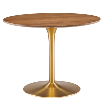 Walnut round tabletop on a gold trumpet pedestal with round base.