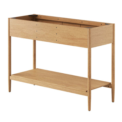 Natural oak bathroom vanity cabinet with two shallow drawers and open lower shelf; mid-century modern, straight-leg design.
