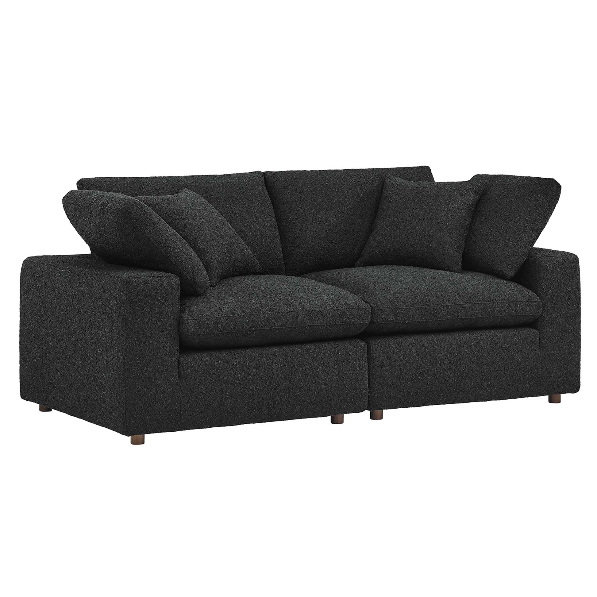 Charcoal gray boucle fabric loveseat with down-filled overstuffed cushions, square arms, and short wooden legs.