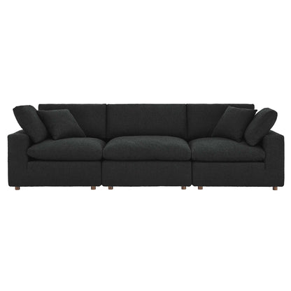 Charcoal fabric 3-seat sofa with straight arms, plush back and seat cushions, and small wooden legs.