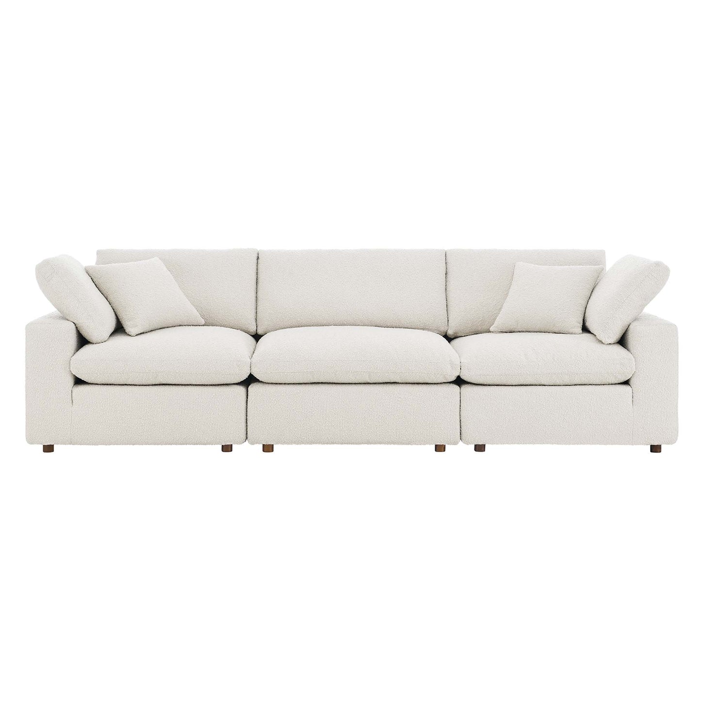 Ivory boucle fabric 3-seater sofa with plush cushions, low arms and wooden legs.