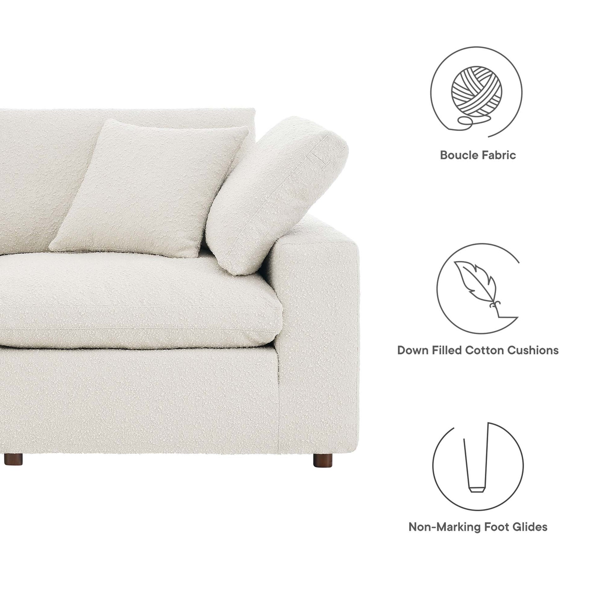 Ivory boucle fabric sofa with plush back cushions, modern clean lines, down-filled cushions, and non-marking foot glides.