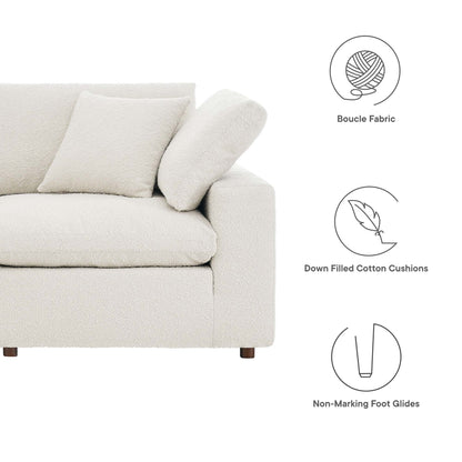 Ivory boucle fabric sofa with plush back cushions, modern clean lines, down-filled cushions, and non-marking foot glides.