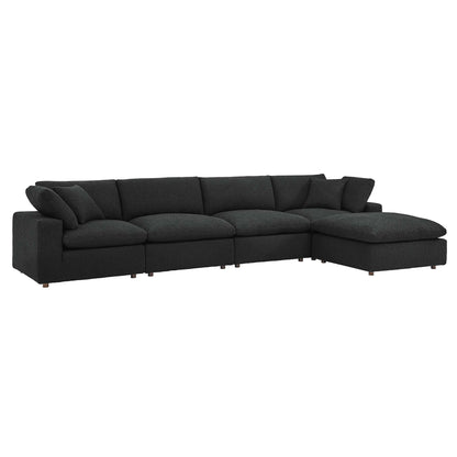 Charcoal black fabric sectional with chaise on the right and low-profile legs.