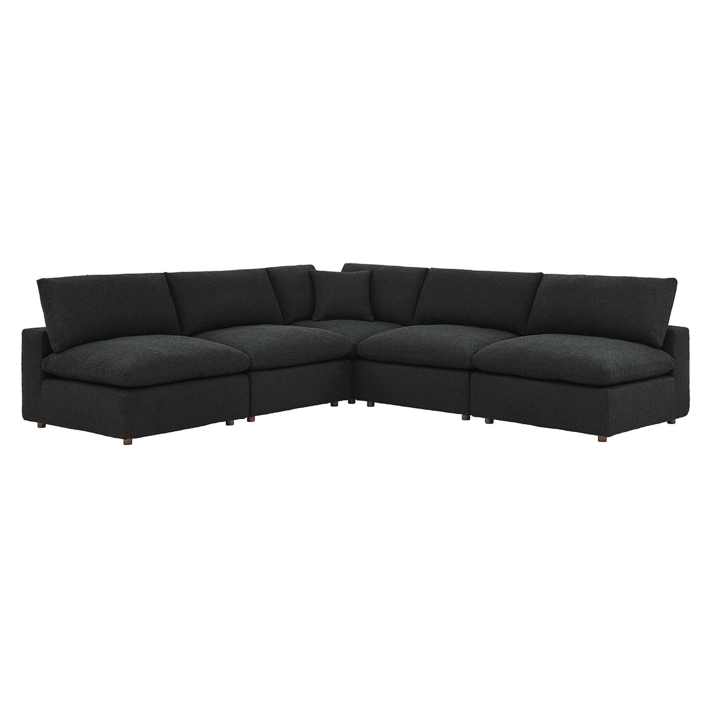 Black L-shaped sectional sofa with chaise, down-filled overstuffed cushions, low arms, boucle fabric upholstery and wooden legs.