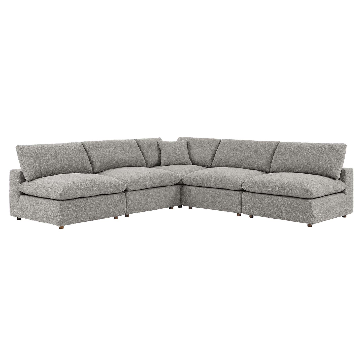 Light gray fabric L-shaped sectional sofa with plush cushions and low wooden legs.