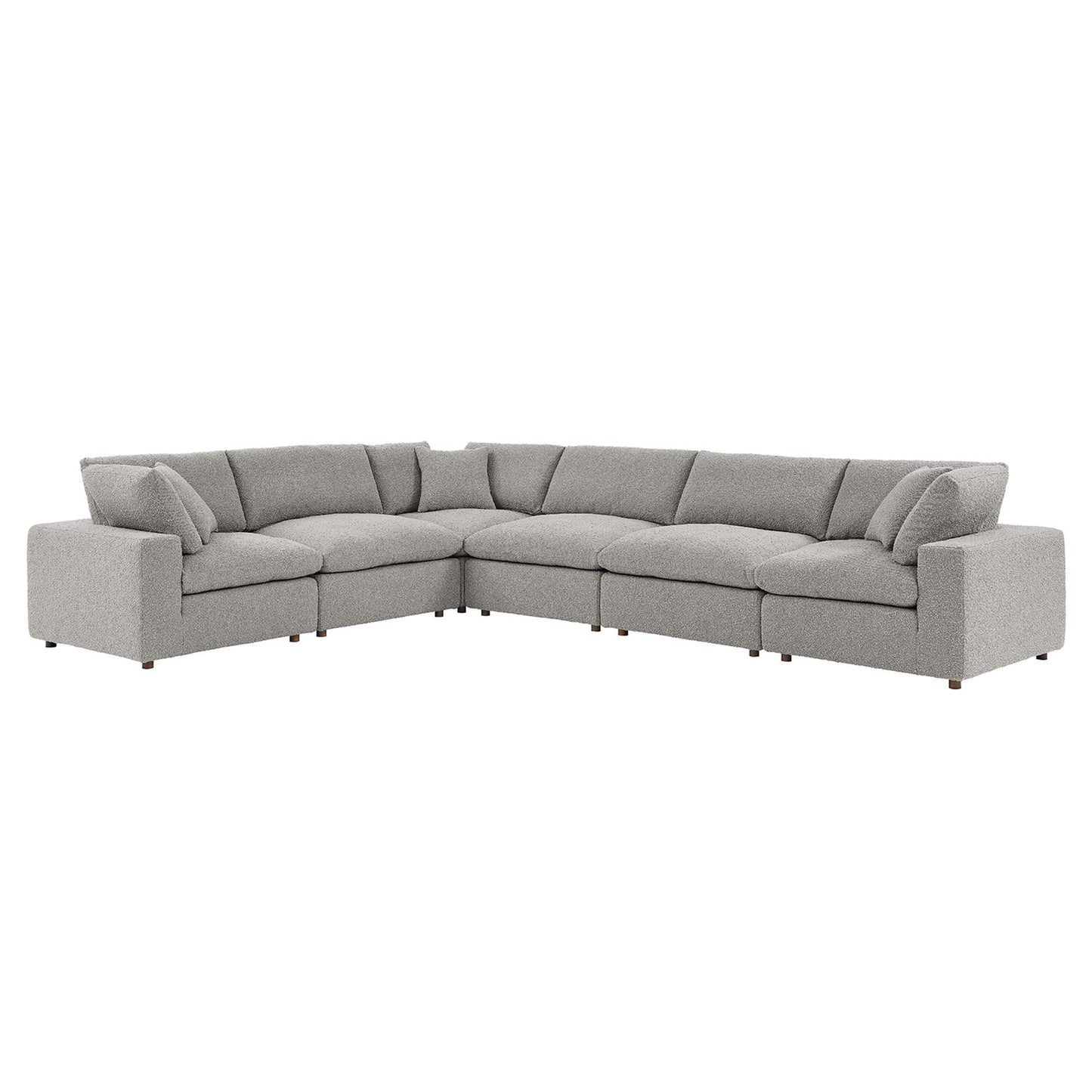 Light gray fabric L-shaped sectional sofa with plush back cushions and tapered wooden legs.