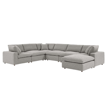Gray fabric L-shaped sectional sofa with right-side chaise and cushioned backs.