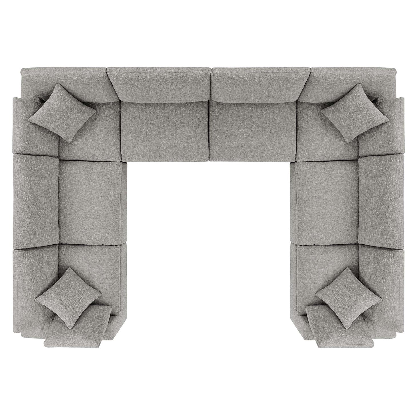 Light gray fabric modular sectional sofa in a U-shaped layout with square cushions and matching pillows.