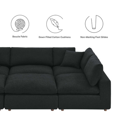Charcoal fabric sectional sofa with plush cushions, low-profile arms and wooden legs; right-side chaise in an L-shape.