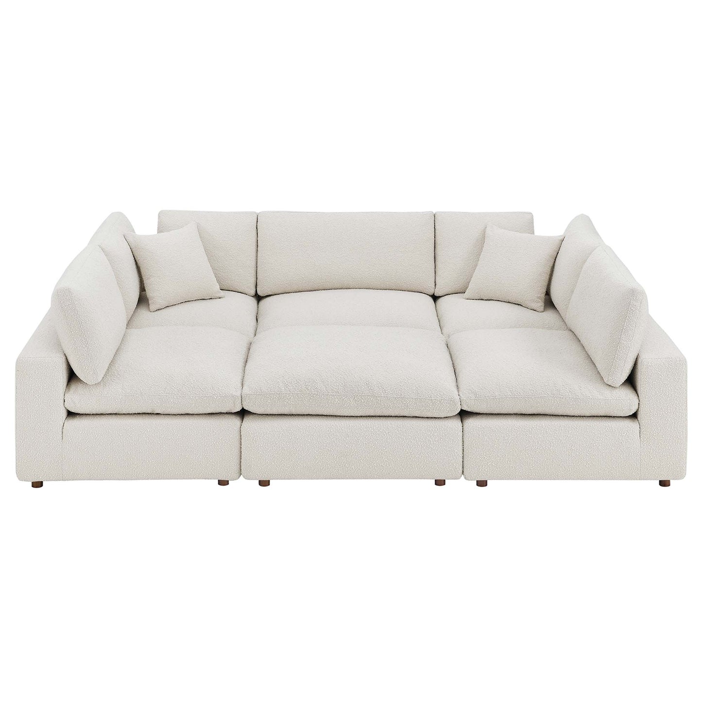 White boucle fabric 6-piece sectional sofa with down-filled, overstuffed cushions and matching back cushions.