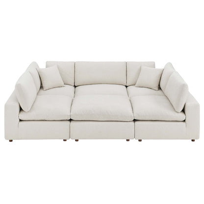 White boucle fabric 6-piece sectional sofa with down-filled, overstuffed cushions and matching back cushions.