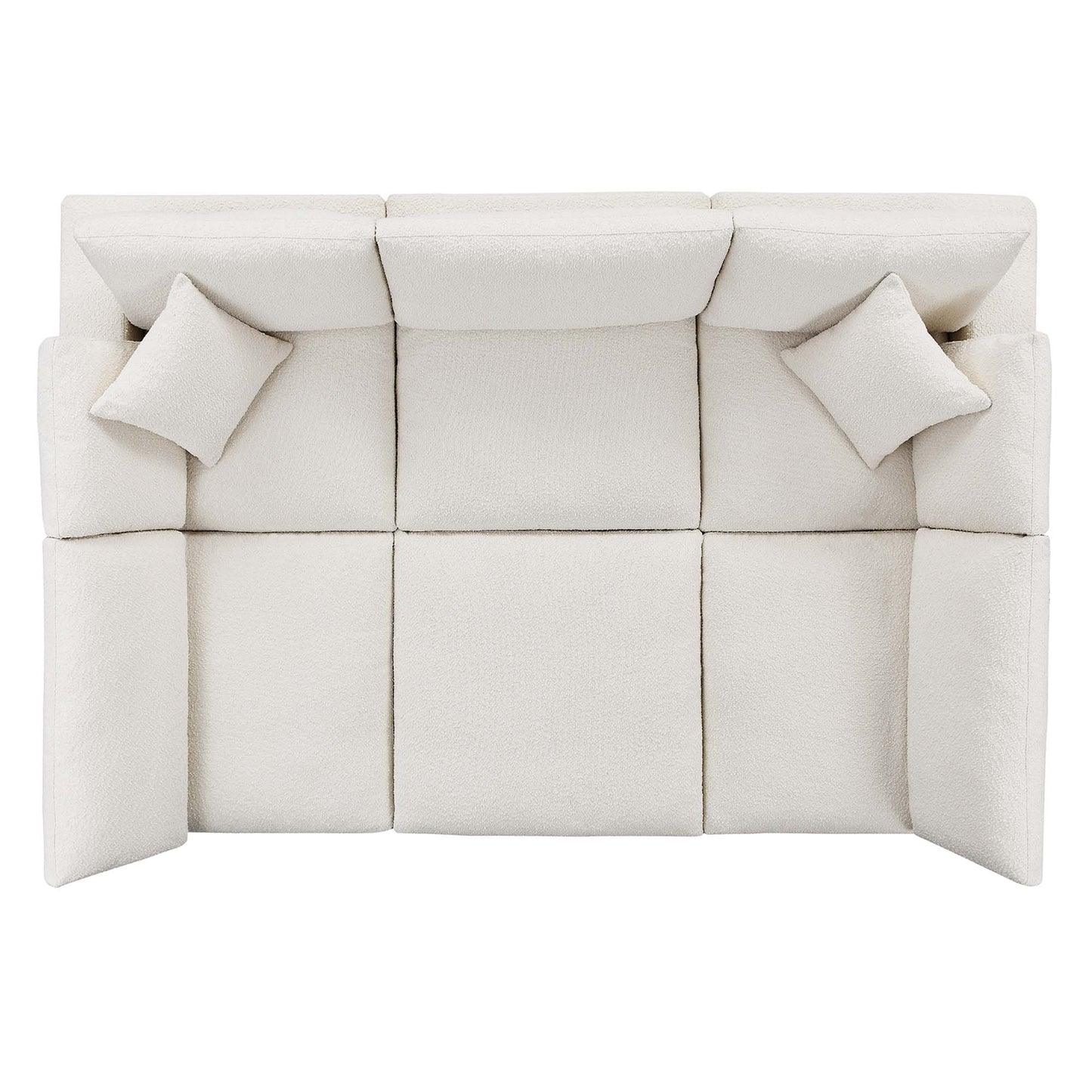 Ivory modular fabric sofa with three seat cushions, back cushions, and two square throw pillows, contemporary style.