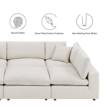 Light ivory boucle fabric sectional with down-filled cotton cushions and non-marking foot glides.