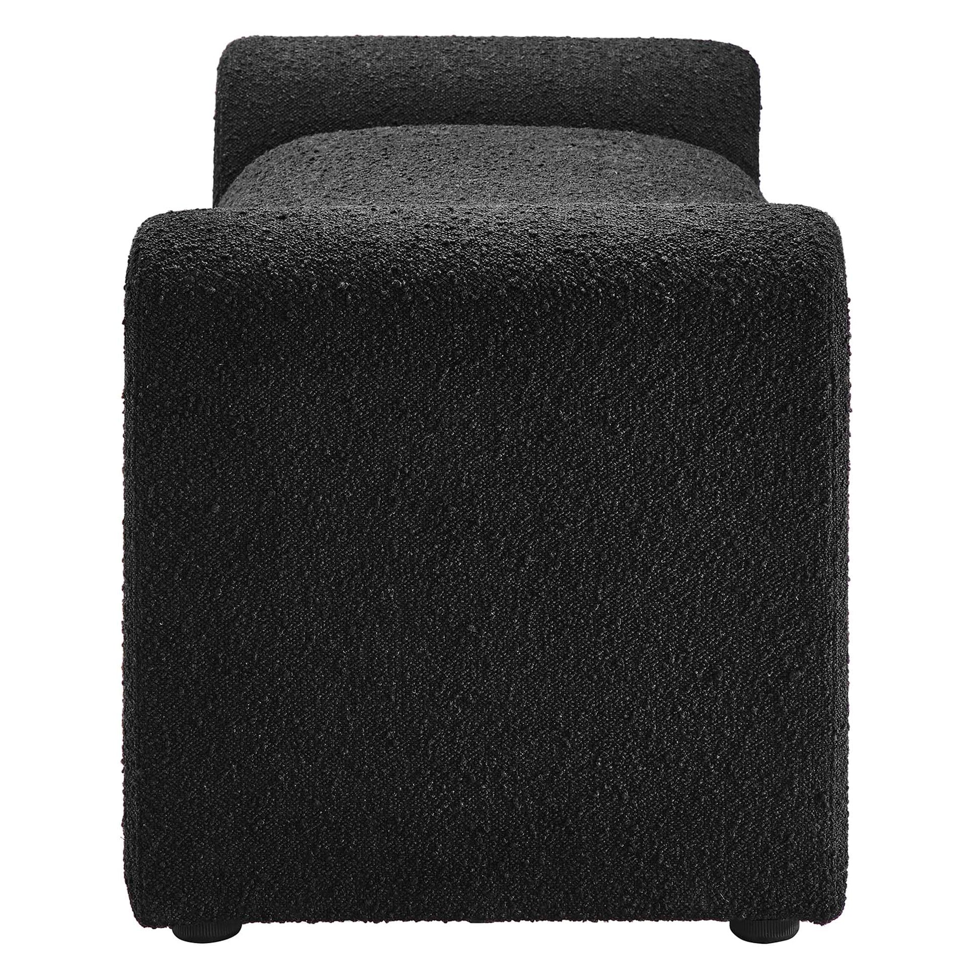 Black boucle fabric bench with a small curved backrest, modern compact seating.
