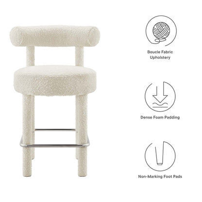 Ivory boucle fabric upholstered counter stool with round padded seat, cylindrical backrest, and chrome footrest.