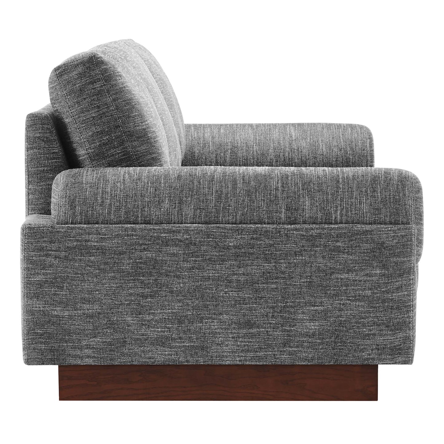 Gray textured fabric sofa with boxy arms, thick cushions, and a dark wood block base.