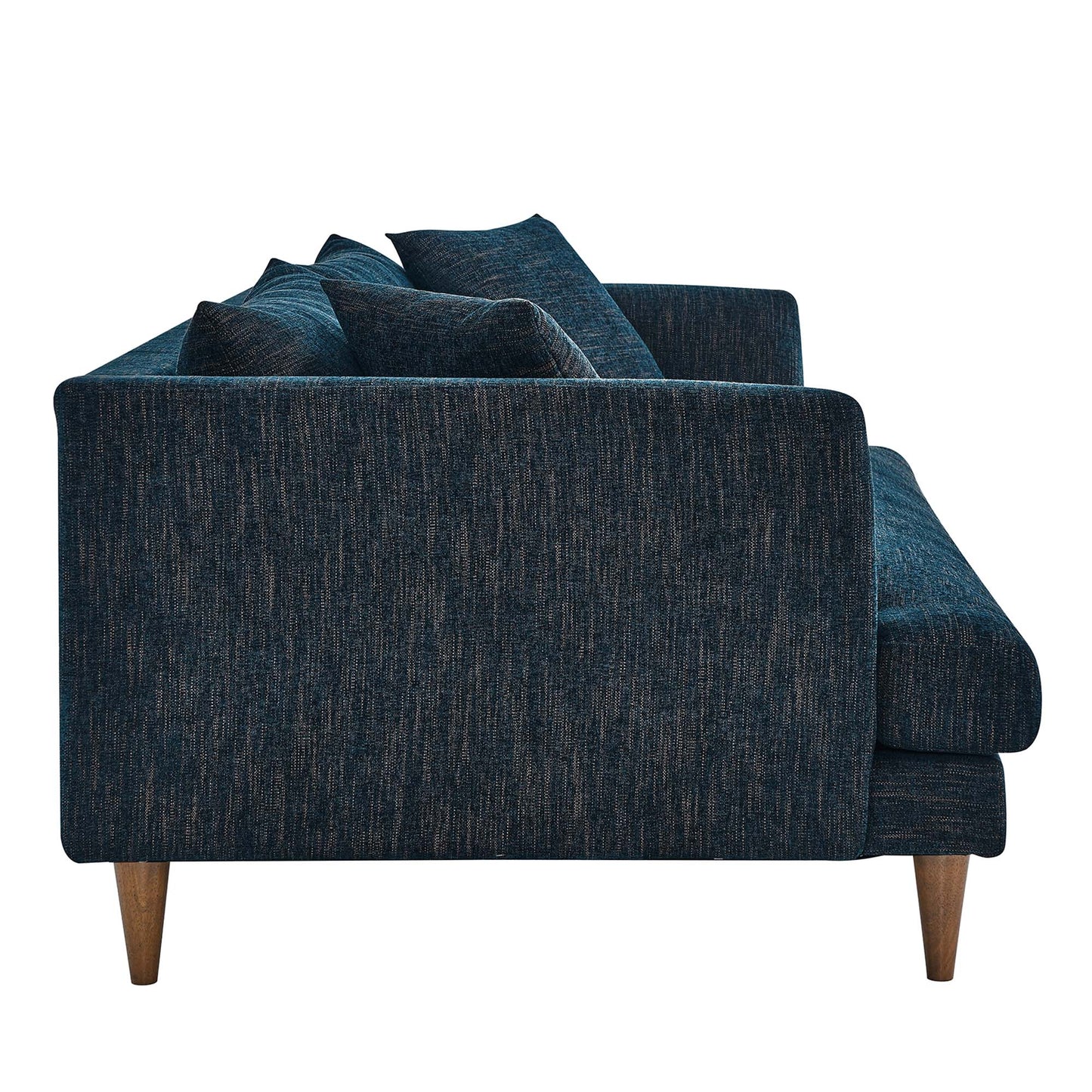 Side view of a dark blue textured fabric sofa with tapered wooden legs and cushions, mid-century style.