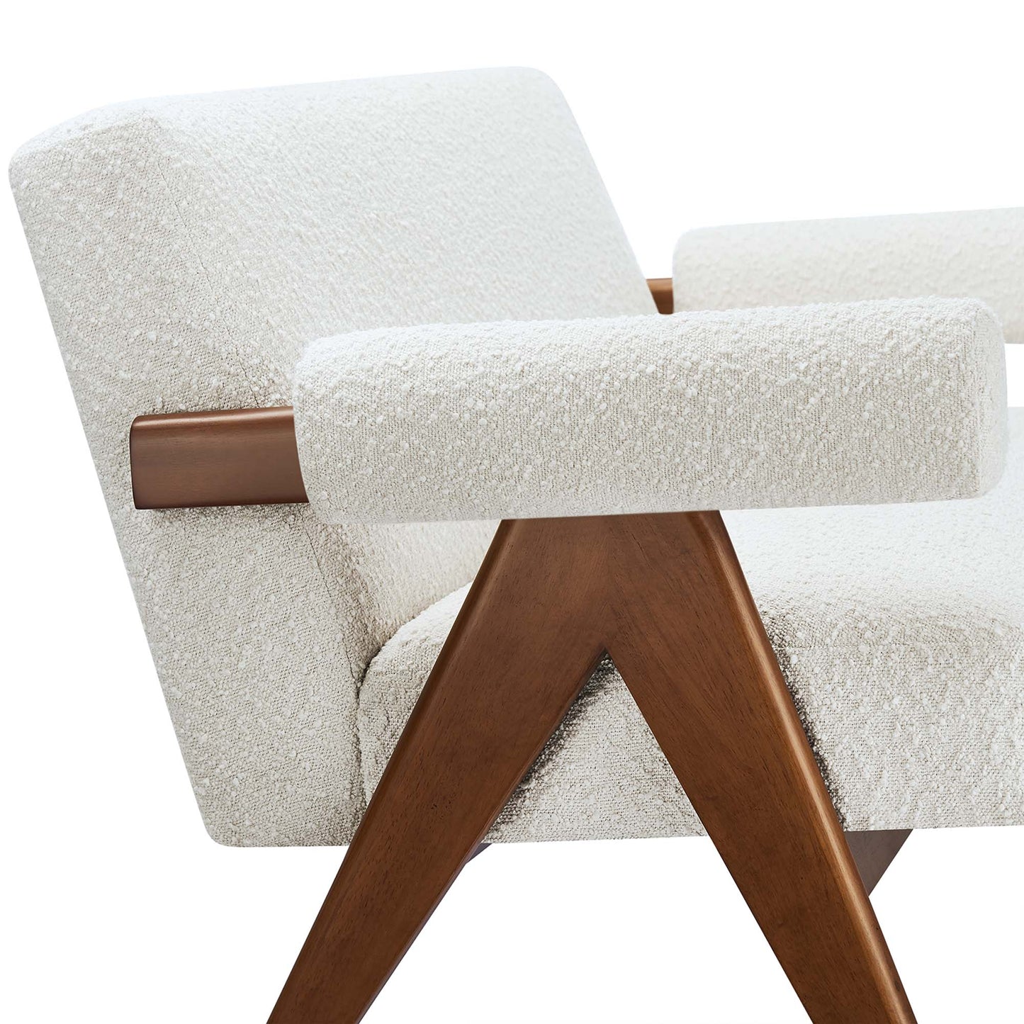 Ivory boucle loveseat with warm wood angled A-frame legs and cushioned armrests in mid-century modern style.