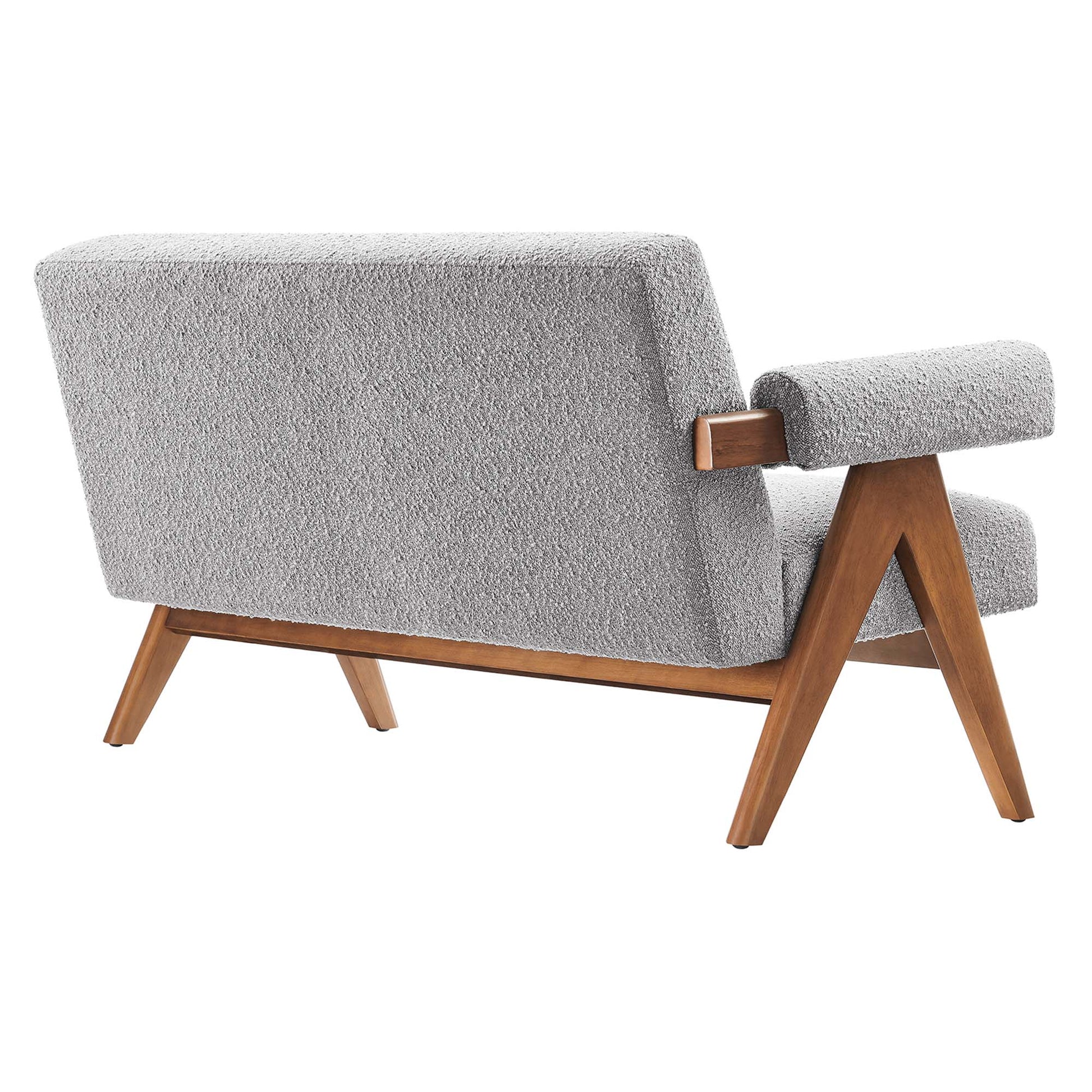 Mid-century modern light gray boucle loveseat with wooden angled legs and padded armrests.