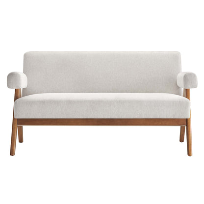 Mid-century modern loveseat in white fabric with walnut wood legs and rounded armrest cushions.