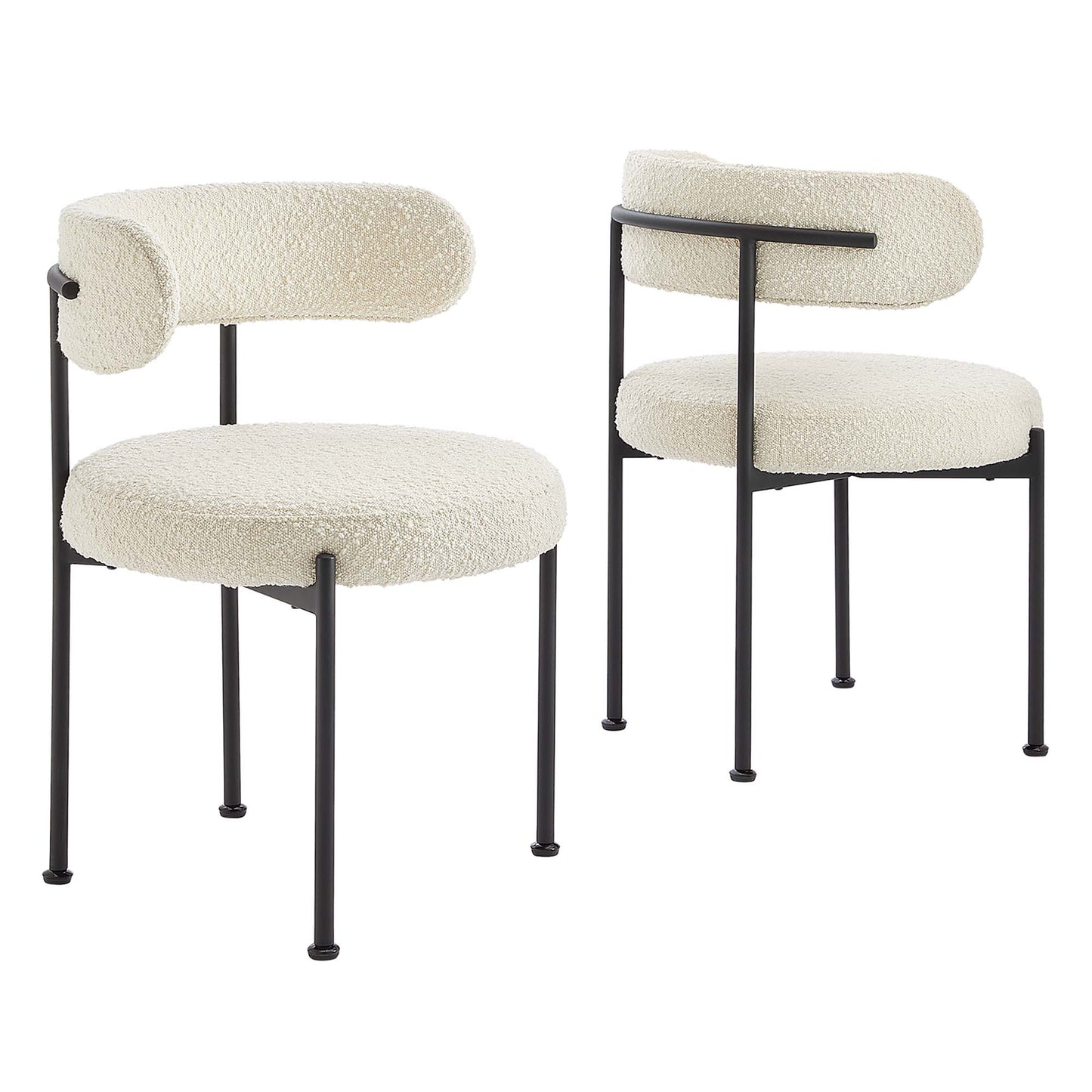 Pair of ivory boucle fabric dining chairs with black metal frames and rounded backrests.