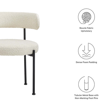 Cream boucle fabric dining chair with rounded back and seat, dense foam padding, on black tubular metal legs; set of 2.