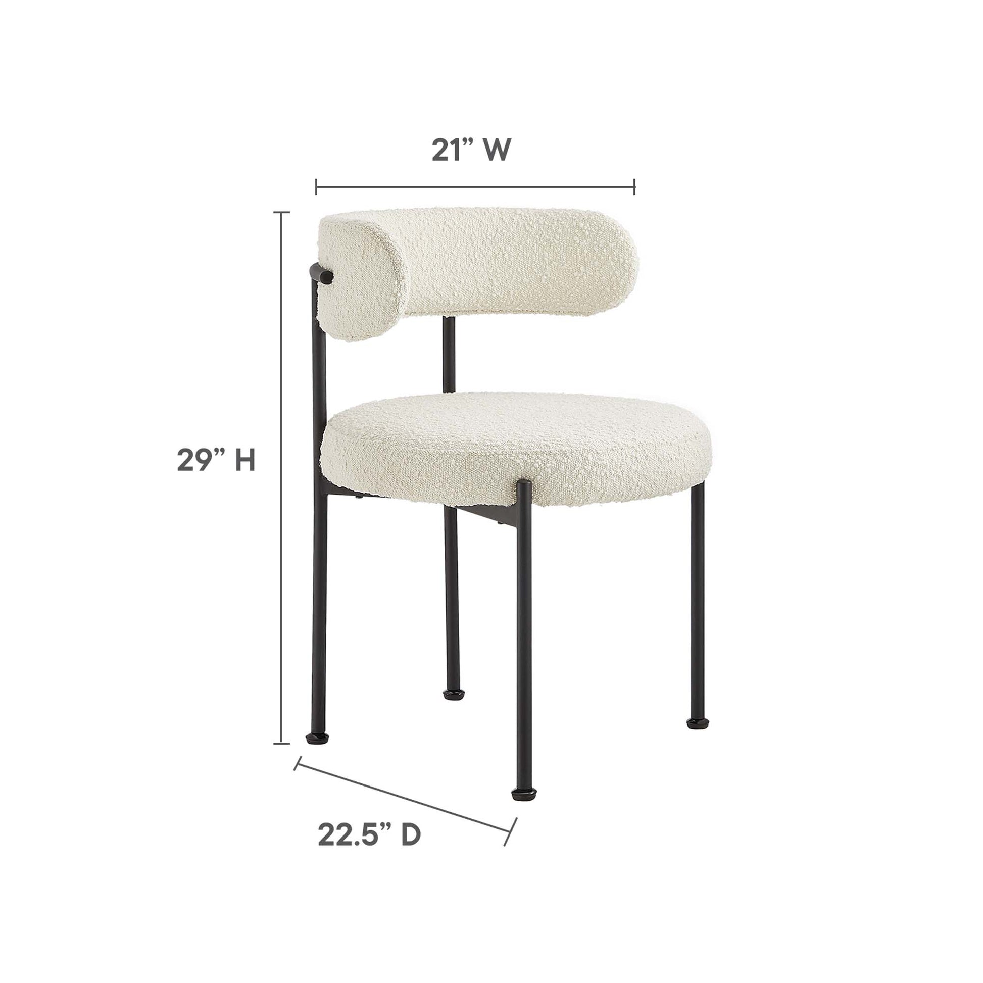 White boucle upholstered dining chairs with black metal legs and rounded back cushions; 21W x 29H x 22.5D; set of 2.