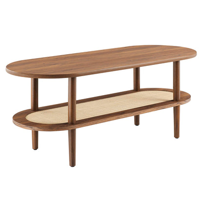 Walnut oval two-tier coffee table with a cane lower shelf and four tapered legs, mid-century modern style
