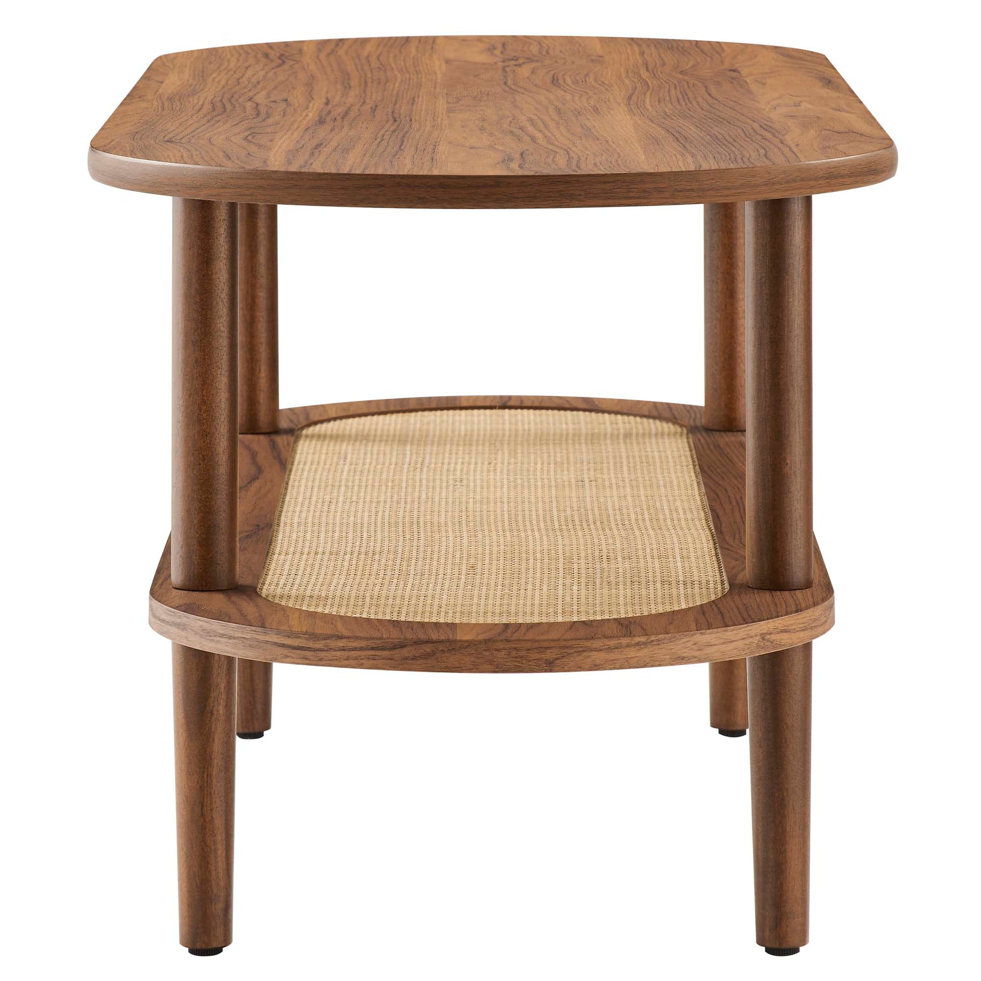 Walnut-finish wooden two-tier coffee table with oval top, four cylindrical legs and woven rattan shelf.